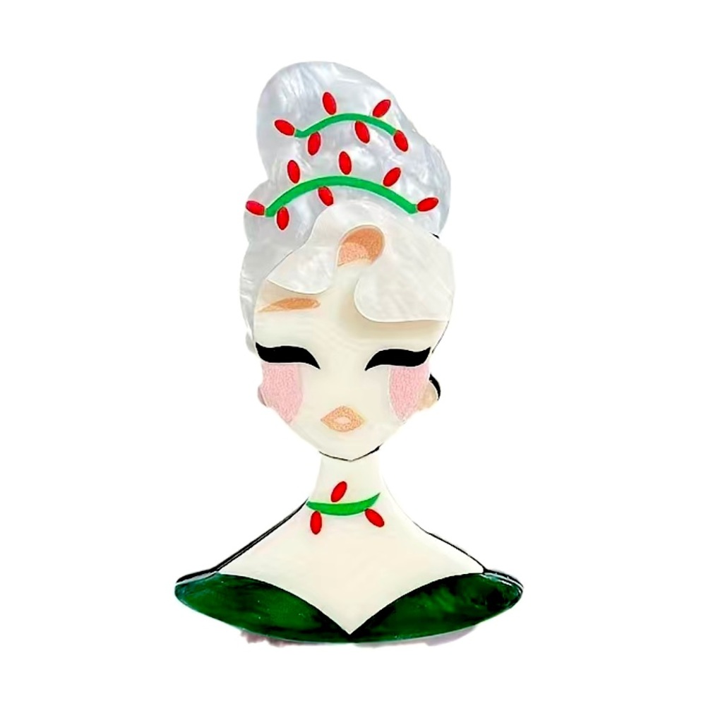 Retro looking acrylic holiday brooch.